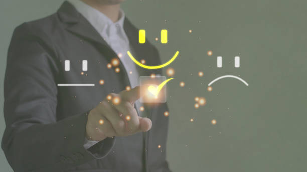 istock Men press smiley face emoticons on virtual touch screens Customer Service Assessment Concept 1783047092
