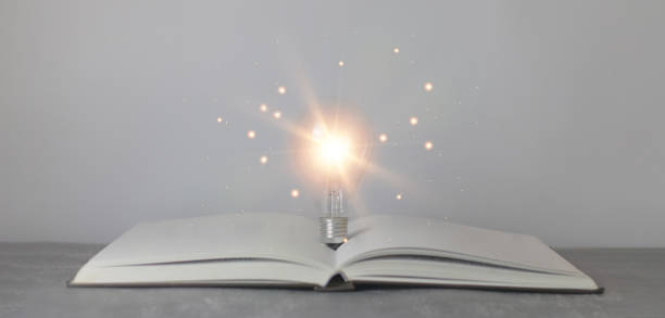 istock light bulb glowing on book, idea of inspiration from reading, innovation idea concept, Self learning or education knowledge and business studying concept. 1783047114
