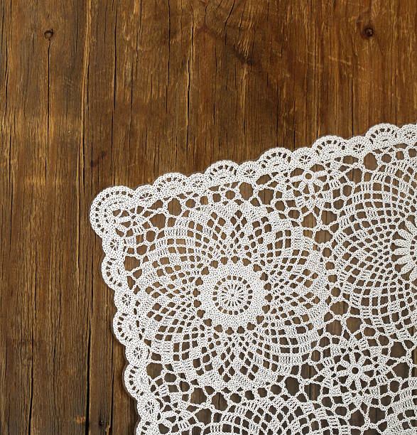 istock wooden background with white lace napkin 178306252