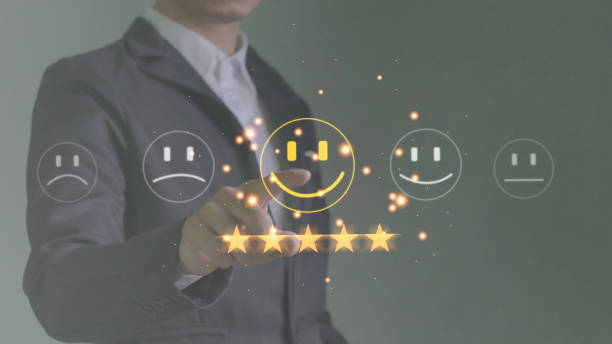 istock Men press smiley face emoticons on virtual touch screens Customer Service Assessment Concept 1783064436