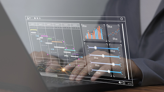 Reports In Computers Analysts Work With Computers In Management Systems To Create Reports ...