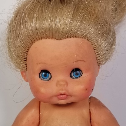 Vintage girl doll toy.