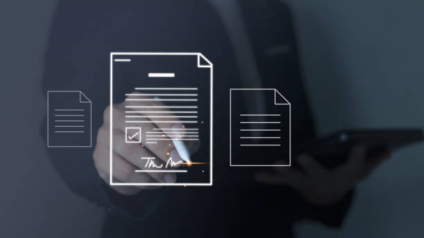 istock electronic signature concept Businessman signing electronic documents on digital documents paperless office future business contract signing 1783077509