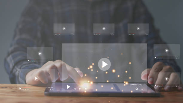 istock Men use tablets for online streaming on virtual screens, watching videos on the Internet, live concerts, performances or tutorials, online content. 1783079654