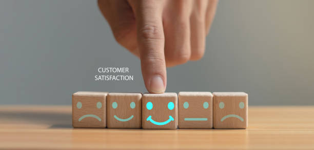 Happy smiley face symbol on the table. Rating. Increased score. Customer experience, satisfaction and best service rating concept with copy space.