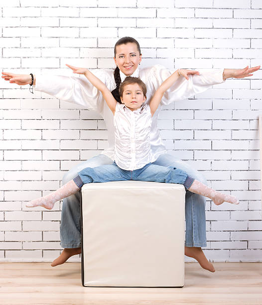 istock Mom and daughter raised their hands 178308959