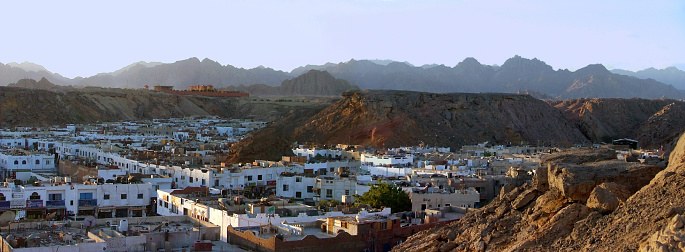 [b]Panoramic view of Sharm El Sheikh, Egypt, showing its bizzarre city development that follows the landscape, softly lit by the setting sun.\nThe picture depicts the real Sharm El Sheikh of local life,  excluding the luxurious touristic developments that have been built on its south.[/b]\n\n\n[url=http://www.istockphoto.com/stock-photo-26575968-cairo-panorama.php][img]http://i.istockimg.com/file_thumbview_approve.php?size=2&id=26575968[/img][/url] \n\n[url=http://www.istockphoto.com/stock-photo-26575056-air-polluted-cairo.php][img]http://i.istockimg.com/file_thumbview_approve.php?size=2&id=26575056[/img][/url] 
