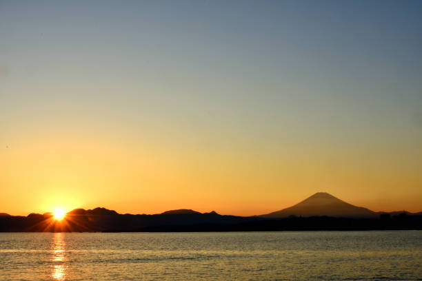 istock The silhouette of Mt. Fuji emerging at dusk. 1783112857