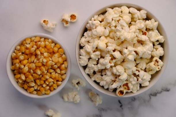 istock Popcorn or corn kernels are a type of snack made from cereal grains that are heated until they explode. 1783116140