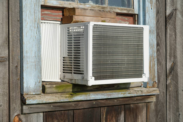istock old air conditioner installed on old wood wall building 1783126282