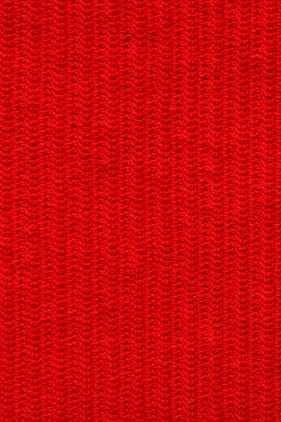 istock texture of red wool knitted yarn, woolen fabric background 1783159504