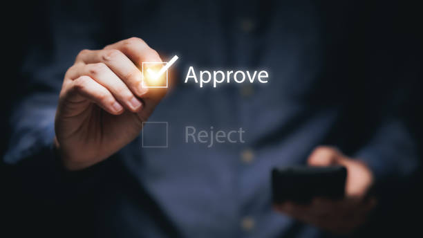 istock Businessman writing or tick correct mark to approve document and project concept. 1783203698