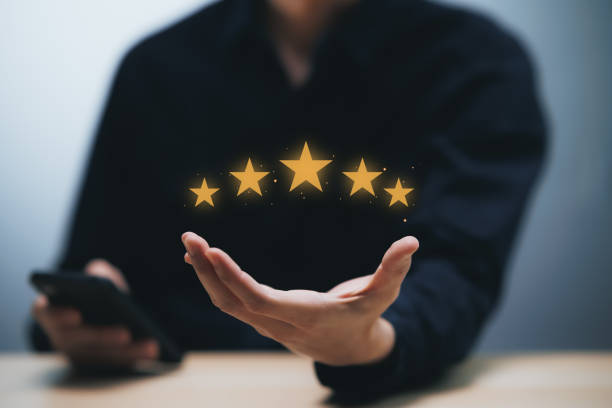 istock Businessman holding golden five stars for client customer feedback and evaluation after use service and product excellent concept. 1783203710
