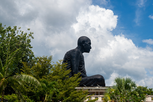Statue of Buddha. Kaew Manee Si Mahathat Temple, Thailand.