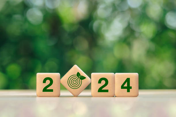 istock 2024 New Year goal for Business plan and development for achieving goals concept.2024 and target icon on a green background.Green business and sustainability investment. 1783266853