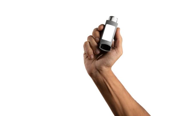 istock Hand holding asthma inhaler equipment.Pharmaceutical product 1783277146