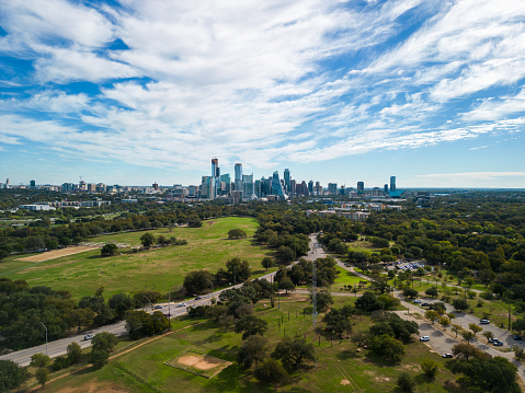 Austin Texas from Zilker park, midday sunny day, aerial drone image