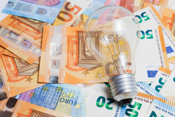 istock light bulb on a pile of euro banknotes 1783291652