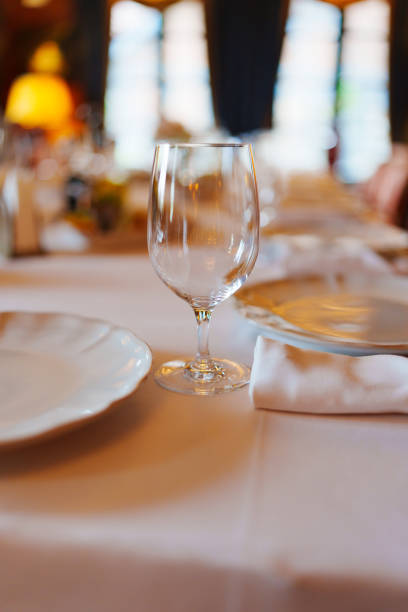 istock An empty wine glass on a table served for a banquet. 1783308855