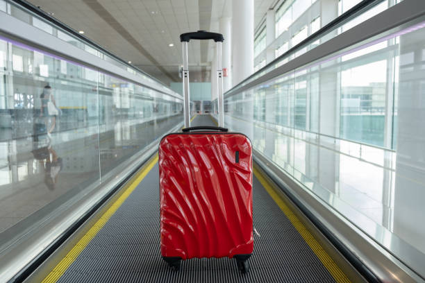 istock red baggage on wheels at airport 1783317481