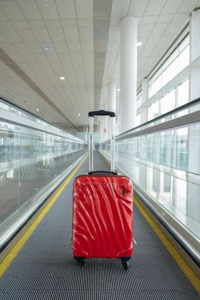istock red baggage on wheels at airport 1783318050