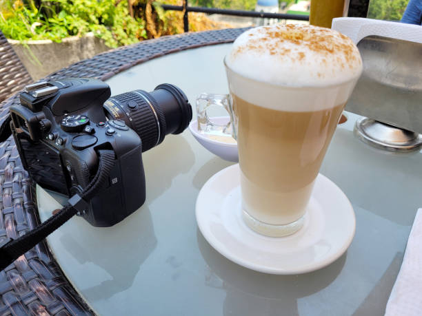 istock Drinking cappuccino coffee in the restaurant with a camera ready to shoot 1783318052