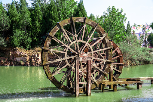 An ancient water wheel in the red stone forest of Fuxi Mountain
