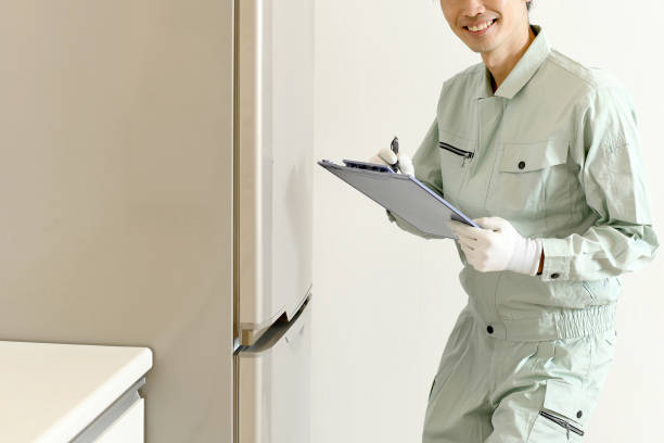 istock Asian male worker checking the refrigerator 1783324435