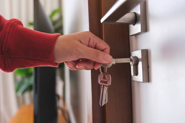 istock Closeup image of a hand using keys to open the door 1783333210