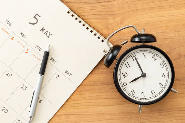 istock A calendar and an alarm clock on the desk. 1783335088