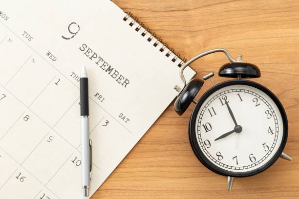 istock A calendar and an alarm clock on the desk. 1783339728