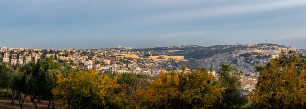 Skyline view of the Old City of Jerusalem looking north A breathtaking, panoramic view of the ancient, Old City of Jerusalem, its walls, houses, synagogues and mosques and the Temple Mount, looking north from the Armon HaNatziv promenade. al aksa stock pictures, royalty-free photos & images