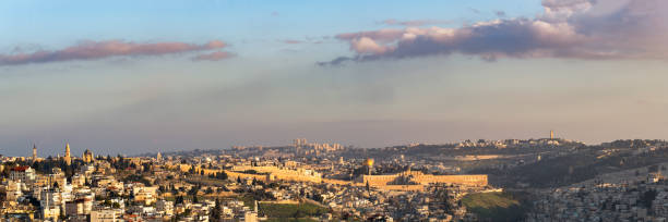 Skyline view of the Old City of Jerusalem looking north A breathtaking, panoramic view of the ancient, Old City of Jerusalem, its walls, houses, synagogues and mosques and the Temple Mount, looking north from the Armon HaNatziv promenade. al aksa stock pictures, royalty-free photos & images