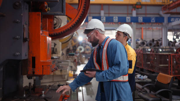 istock Engineer and technician discussing machinery in factory to plan inspection maintenance according to usage cycle, Concepts inspections based on usage cycle maintenance 1783360471