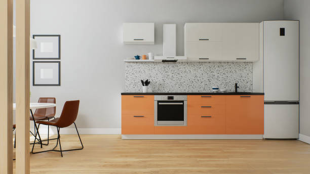 istock The interior of a small kitchen, orange bottom white top. 3D rendering. 1783369176