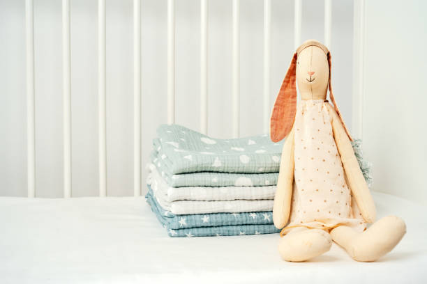 istock Stack of cotton blankets for a newborn in a cradle 1783397837