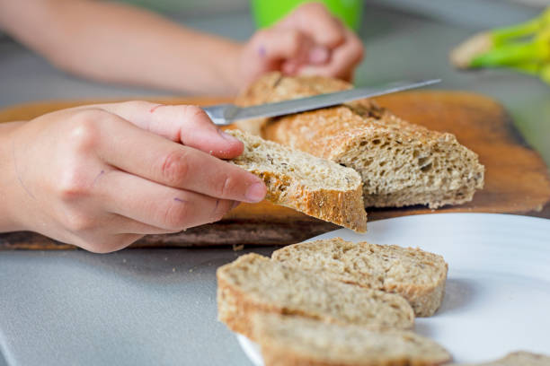 istock put a piece of bread on a white plate. 1783427579