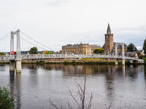 Inverness, UK - September 13, 2023: Greig Street suspension bridge over River Ness