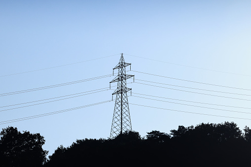 Power lines, electricity pylons and wind turbines seen in Germany