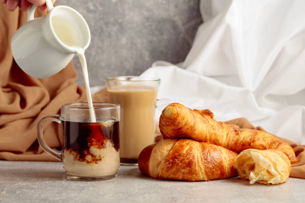 istock Croissants and coffee with cream. 1783463216