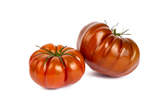istock Natural organic village tomatoes on a white background 1783516808