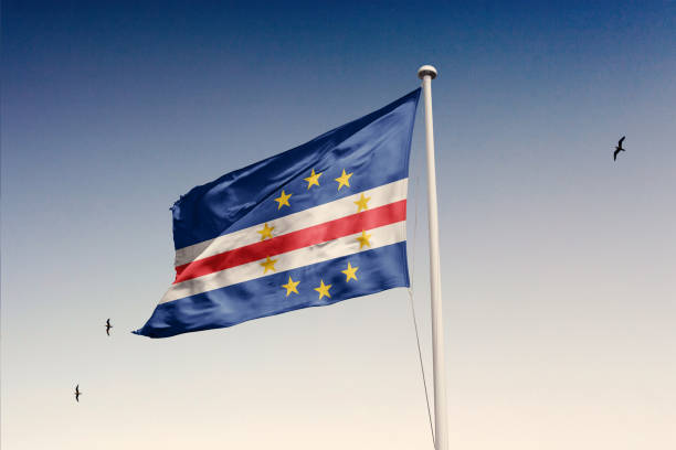 Cape Verde Islands flag fluttering in the wind on sky.