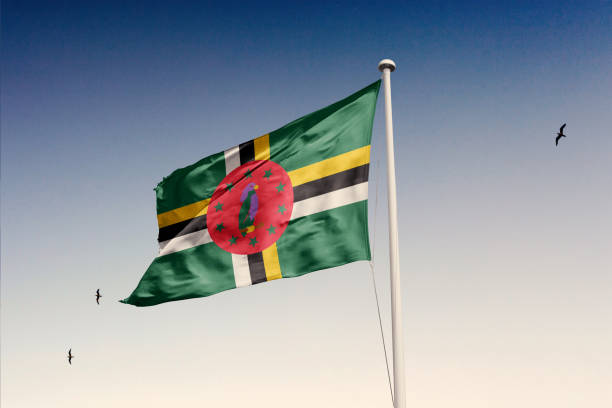Dominica flag isolated on the sky with clipping path.