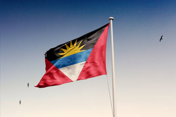 Antigua and Barbuda flag isolated on the sky with clipping path.
