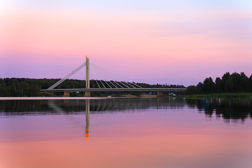 Incredible sunset over the bridge in Rovaniemi Finland. Polar day. Lapland trip