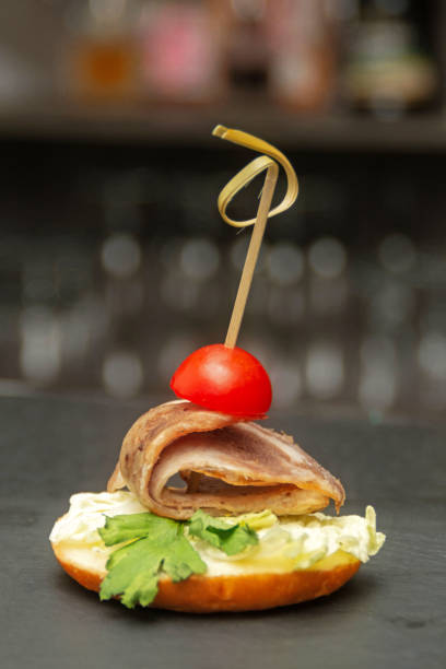 buffet canape of soft cheese and smoked beef - smoked tongue imagens e fotografias de stock