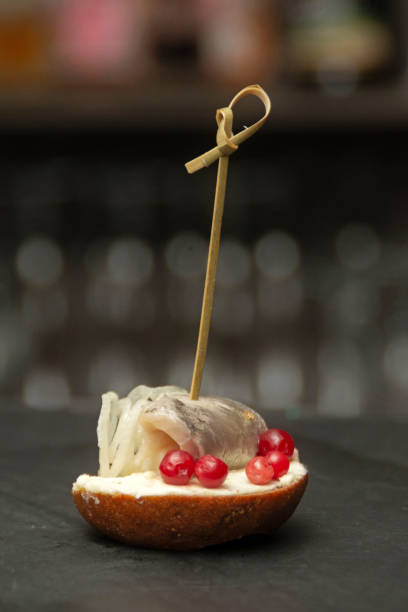 istock Buffet canape with salted herring and butter 1783573933