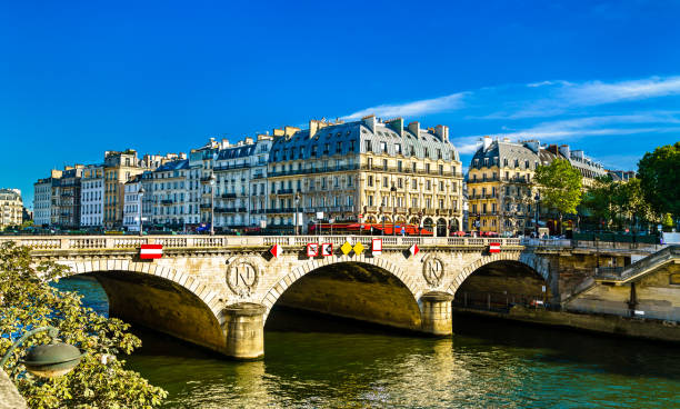 istock Saint Michel bridge across the Seine river in Paris 1783575148