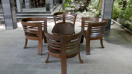 Wooden Chairs and Table at Lembah Tumpang, Malang, East Java, Indonesia. January 17, 2023
