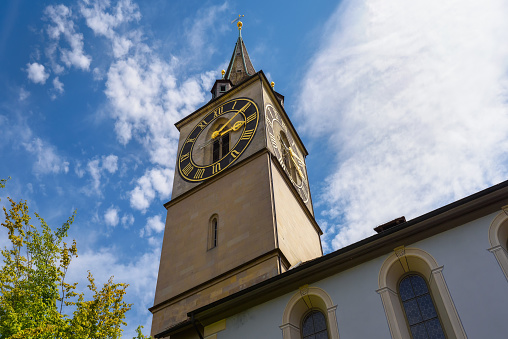 Old tower clock of St. Peter's Church, Zurich, Switzerland. The largest clock in Europe. Close-up with details